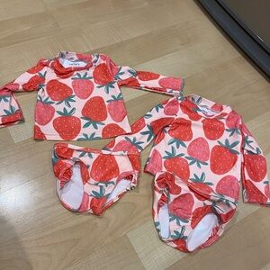 Two Carter's Pink and Red Strawberry Baby Bathing Suit Sets